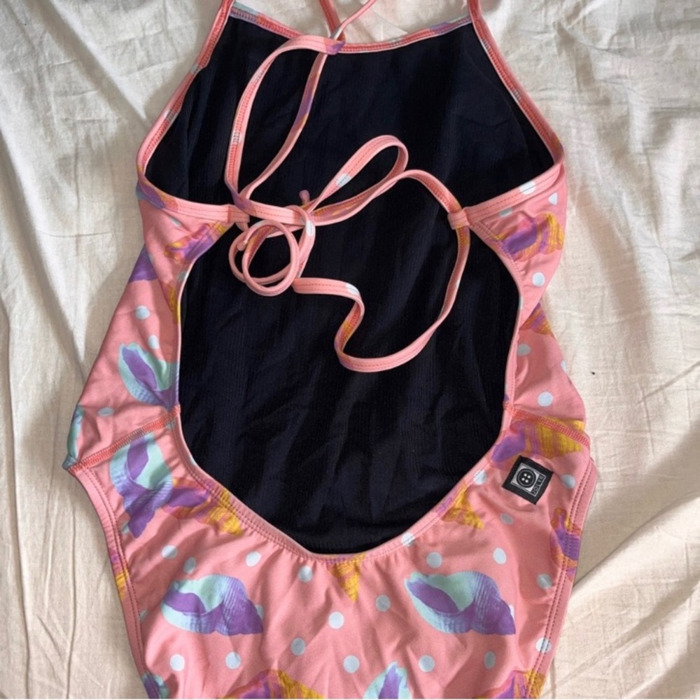 Jolyn Jackson 4 she’ll onesie
